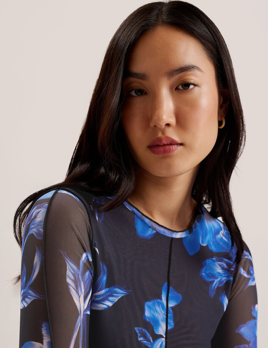 dekotha - top de manga larga de malla con estampado floral