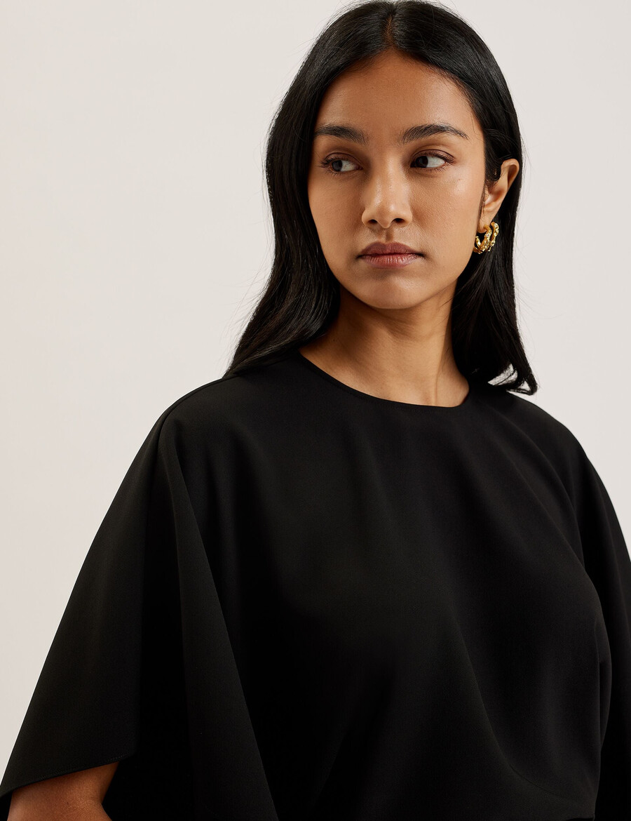 cherika - blusa tejida de manga corta con estampado de murciélago