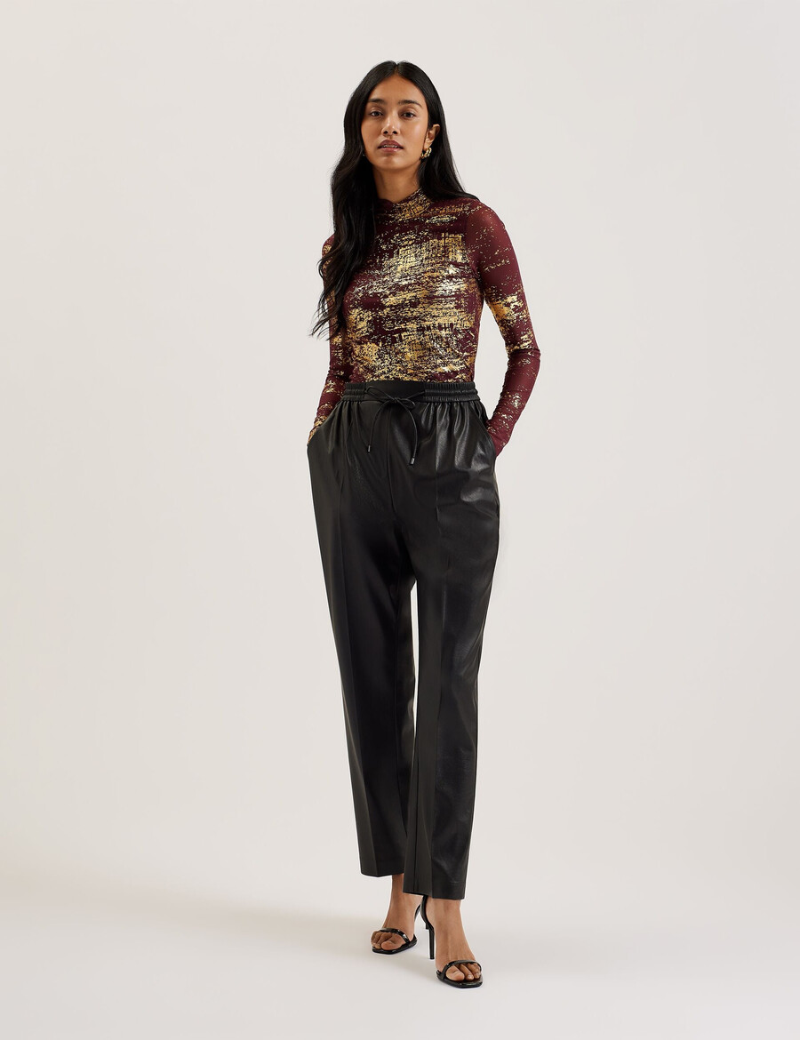 sofiy - top de cuello alto de malla con estampado metalizado
